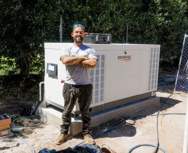 An In Charge electrician installing a liquid cooled generator at a home in Central Texas.